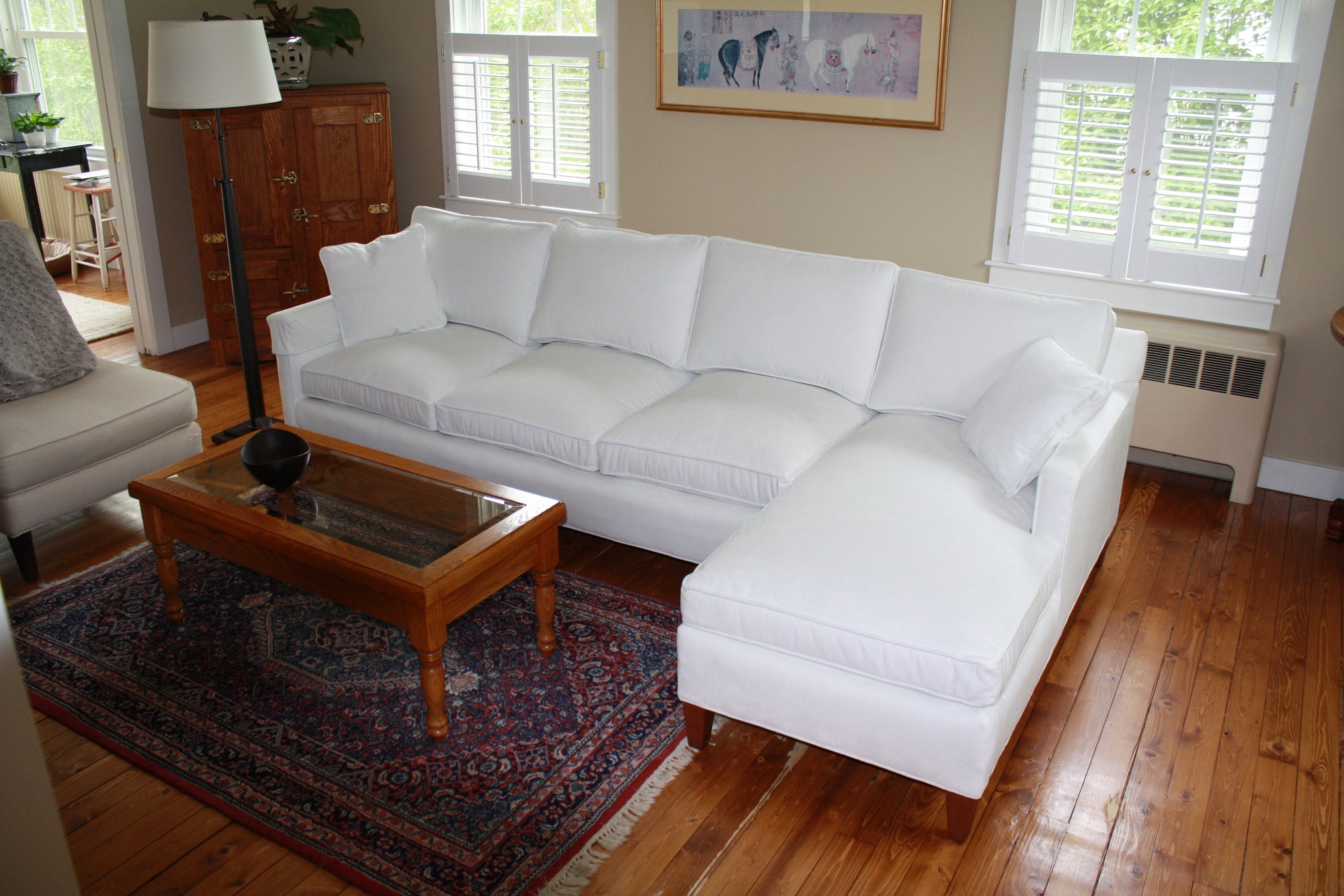 A bright white small sectional sofa