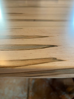 See the grain and streaking through the wood top
